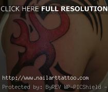 browning symbol tattoos on hip