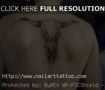 bull skull tattoo on back