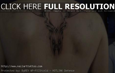 bull skull tattoo on back