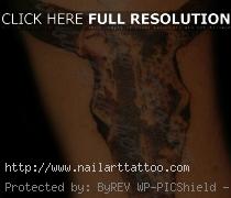 bull skull tattoos with feathers