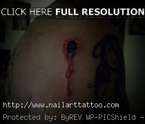 bullet hole tattoo pictures