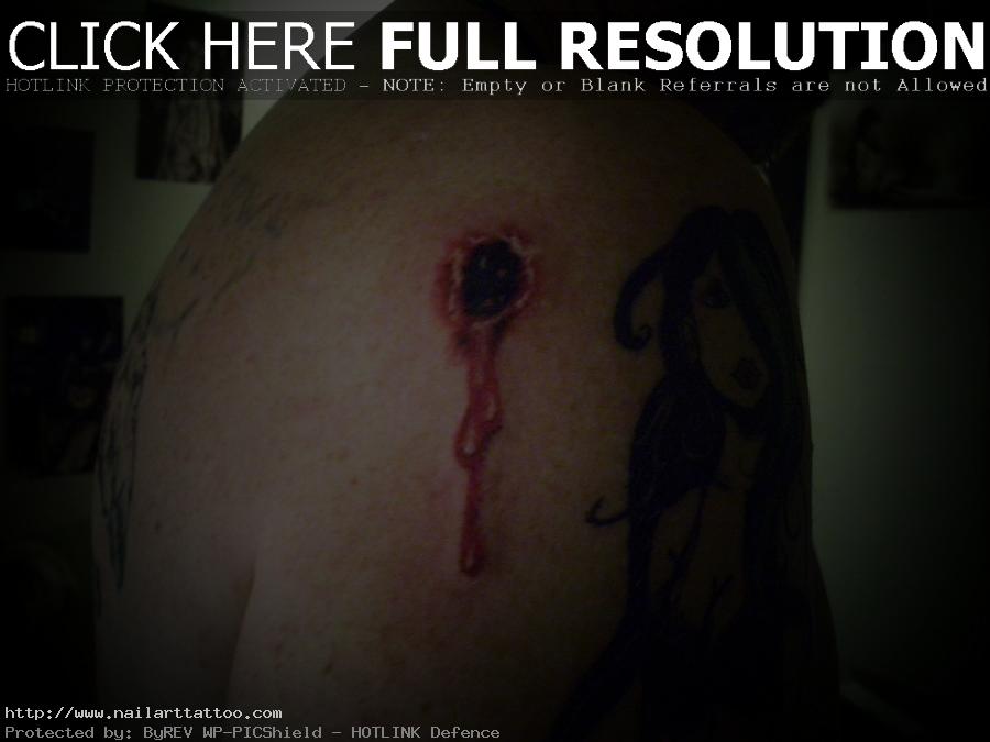 bullet hole tattoo pictures