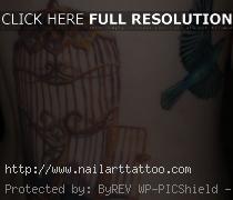 caged bird tattoo