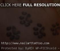 cat paw print tattoo