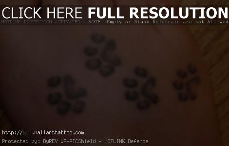 cat paw print tattoo