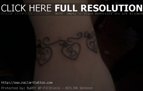 charm bracelet tattoo with initials