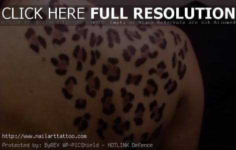cheetah print tattoo designs on thigh