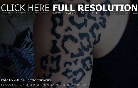 cheetah print tattoos on arm