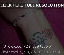 cherry blossom flower tattoo wrist