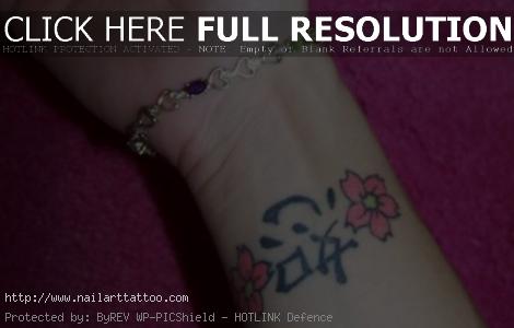 cherry blossom flower tattoo wrist
