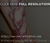 cherry blossom tree tattoos on leg