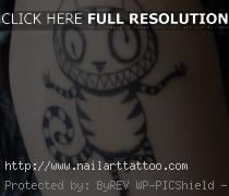 cheshire cat tattoo meaning