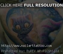 cheshire cat tattoo ribs