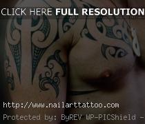 chest shoulder tattoo