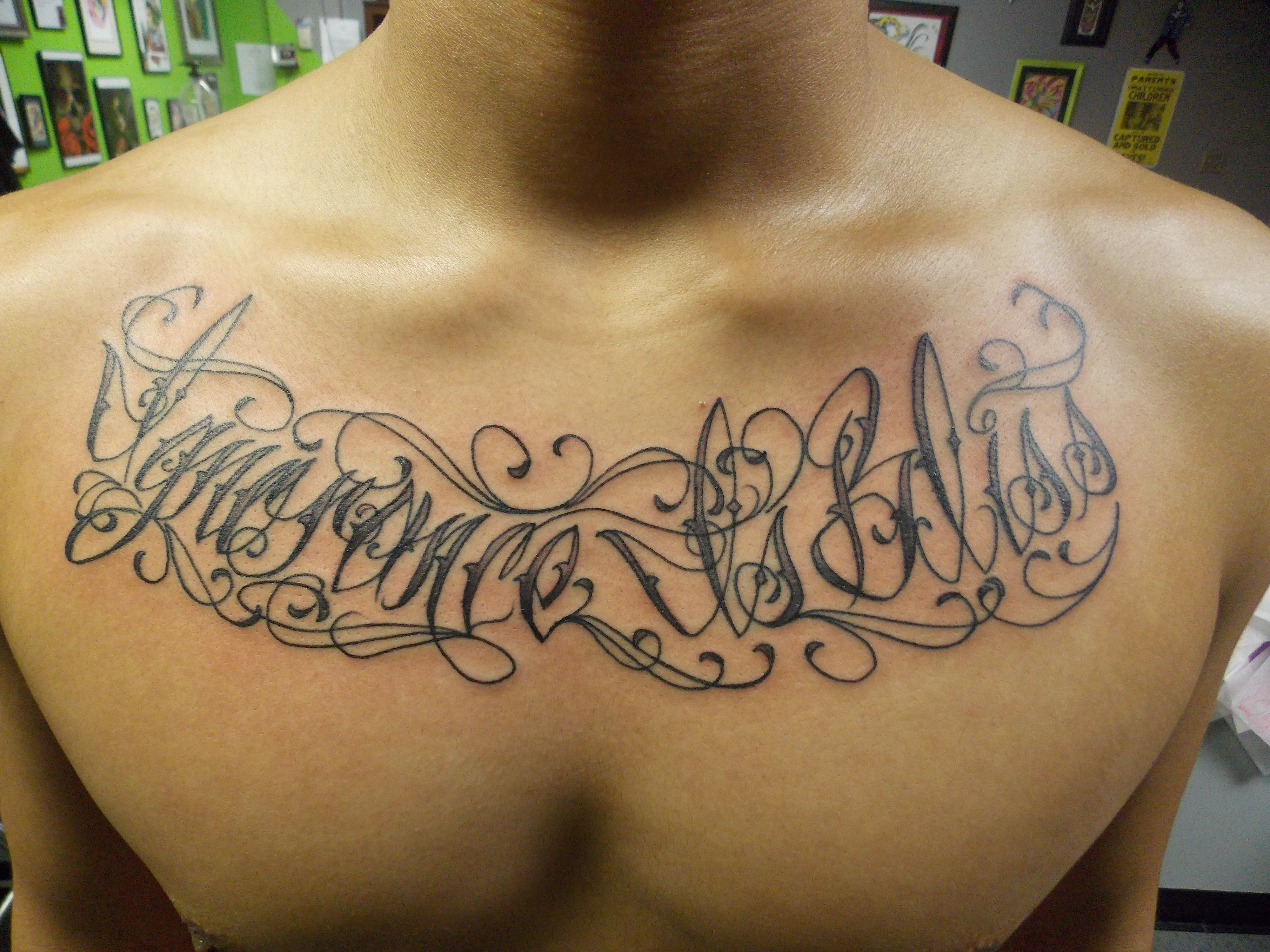 chest tattoo designs writing