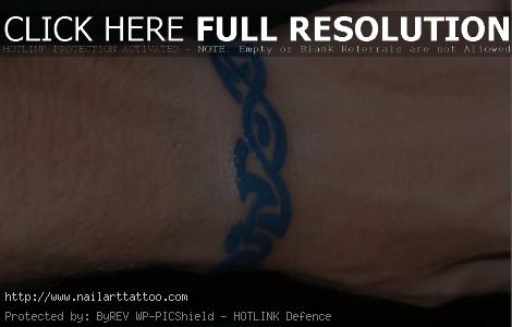 chi rho tattoo wrist