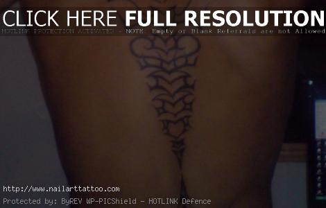 chinese symbol tattoos down spine