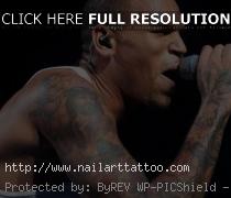 chris brown arm tattoos