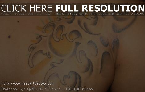 female chest shoulder tattoo