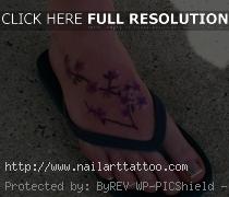 japanese cherry blossom foot tattoos