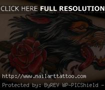 red and black wolf tattoo