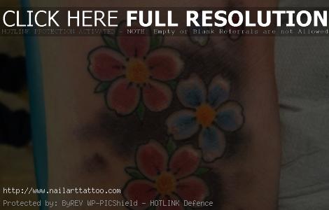 simple cherry blossom back tattoo