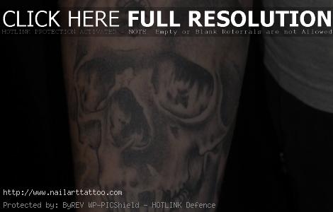 skull with bullet hole tattoo