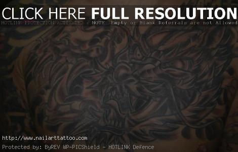 tribal chest plate tattoos