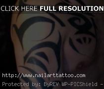 tribal chest shoulder tattoo