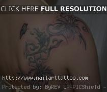 butterfly and flower back tattoos