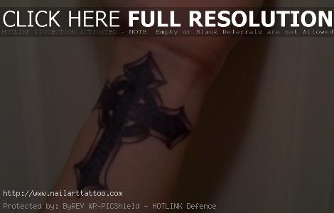 cross on wrist tattoo