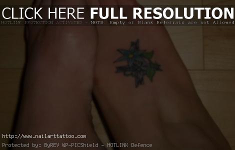 cross tattoo on foot