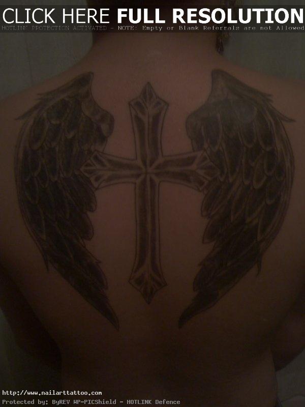 cross with angel wings tattoo