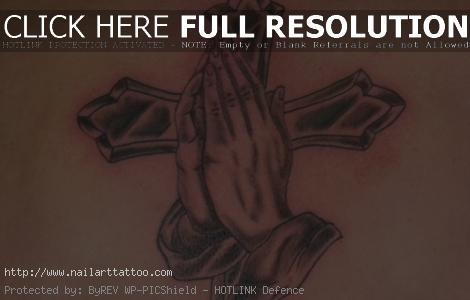 cross with praying hands tattoo