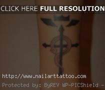 cross wrist tattoo