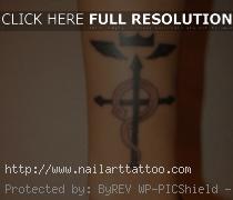 cross wrist tattoos