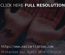 demi lovato hand tattoo