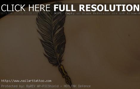 feather pen tattoo