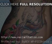 female stomach tattoos