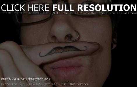 finger mustache tattoo