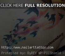 flock of birds tattoo on shoulder