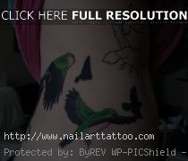 flock of birds tattoo on side