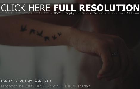 flock of birds tattoo on wrist