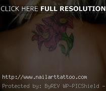 flower cover up tattoos back