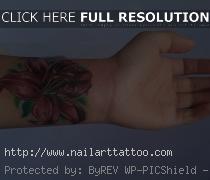 flower cover up tattoos on wrist