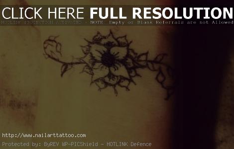 flower design tattoos wrist
