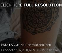 flower of life tattoo arm