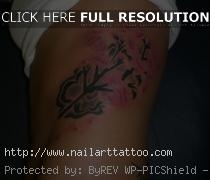 flower rib tattoos