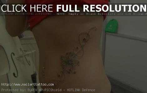 flower rib tattoos for girls