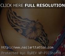 hawaiian flower and star tattoos